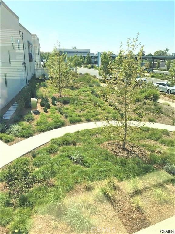 125 Fixie Irvine, CA 92618 - Photo 3 of 28 a view of a lake with a big yard