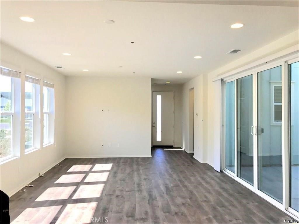 125 Fixie Irvine, CA 92618 - Photo 6 of 28 a view of hallway with a large window and entryway