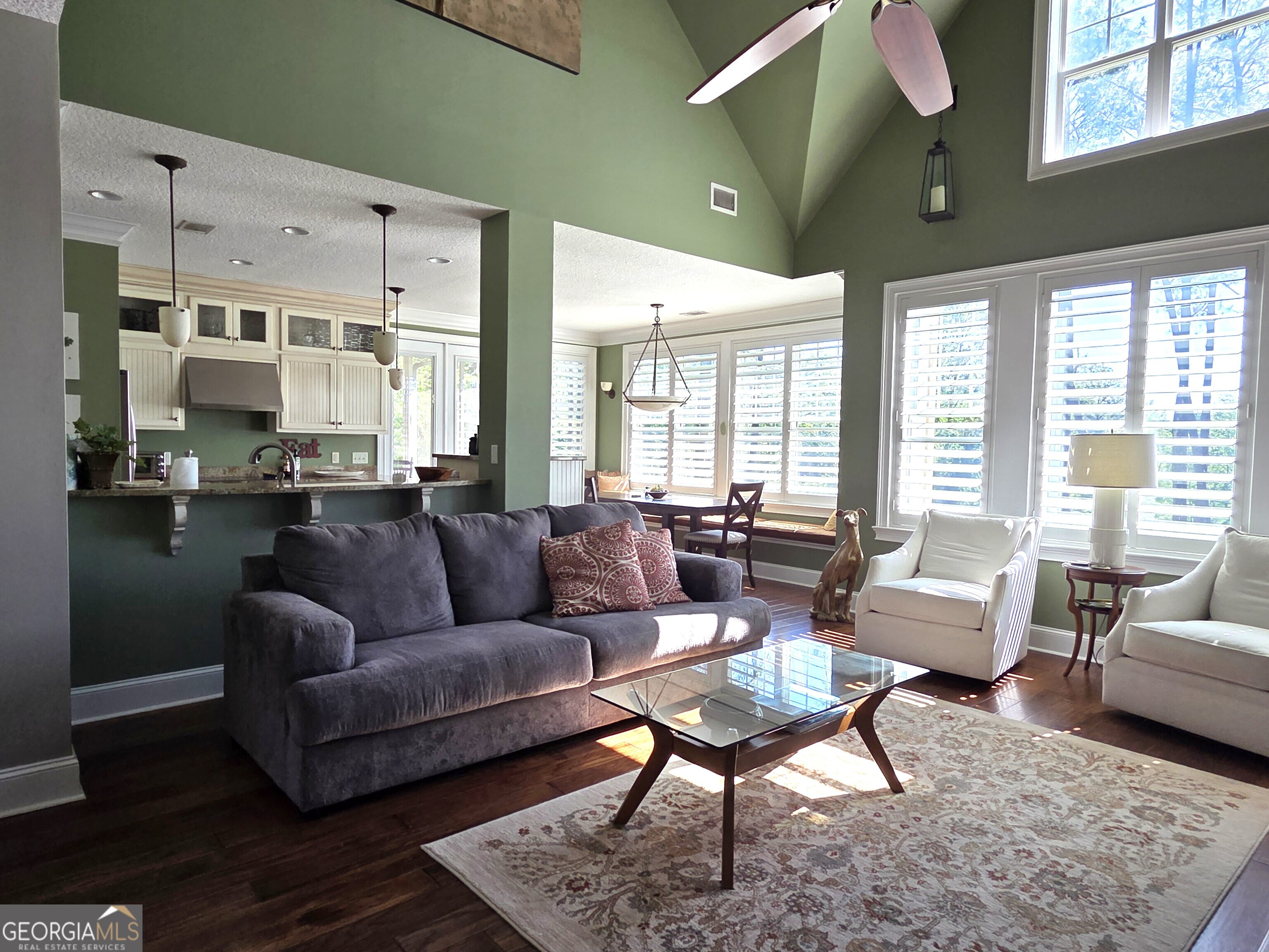 300 Hammond Powell Road Hazlehurst, GA 31539 - Photo 39 of 91 a living room with furniture wooden floor and a large window