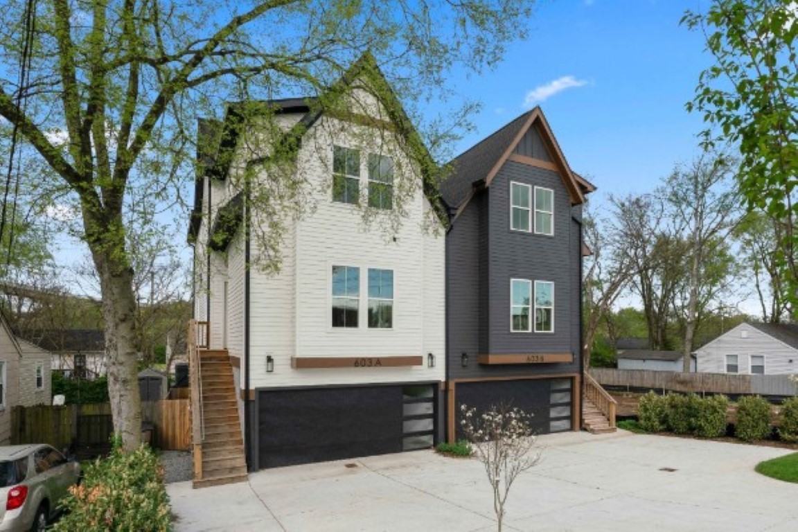 603 Morrow Road, Unit A Nashville, TN 37209 - Photo 1 of 38 a front view of a house with parking