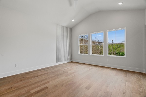 603 Morrow Road, Unit A Nashville, TN 37209 - Photo 20 of 38 a view of an empty room with a window and wooden floor
