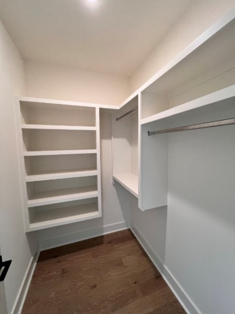 603 Morrow Road, Unit A Nashville, TN 37209 - Photo 23 of 38 a view of walk in closet with empty racks