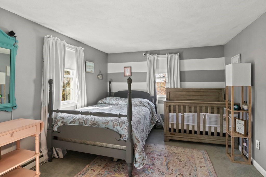 93 Palmer Road Plymouth, MA 02360 - Photo 16 of 34 a bedroom with a bed and a window
