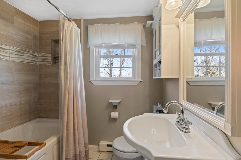 93 Palmer Road Plymouth, MA 02360 - Photo 17 of 34 a bathroom with a sink toilet and shower
