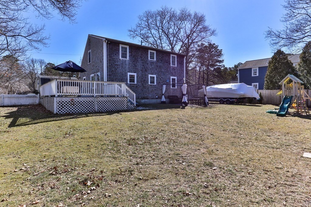 93 Palmer Road Plymouth, MA 02360 - Photo 22 of 34 a view of a house with a yard