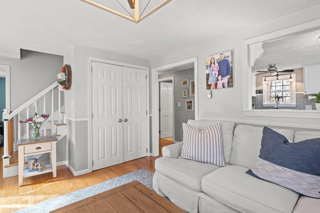 93 Palmer Road Plymouth, MA 02360 - Photo 6 of 34 a living room with furniture and a wooden floor