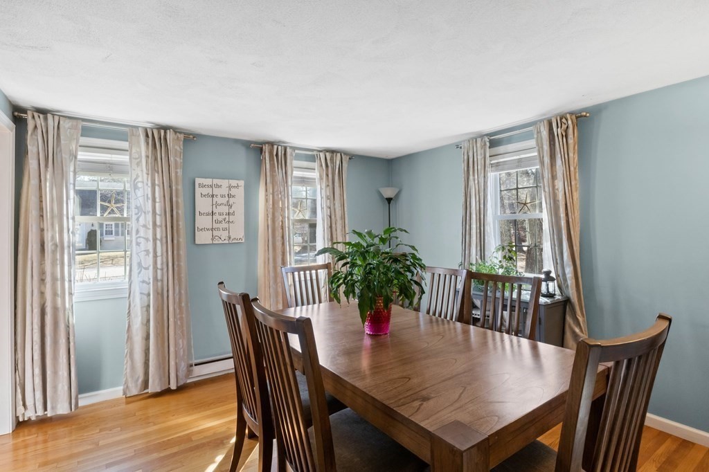 93 Palmer Road Plymouth, MA 02360 - Photo 10 of 34 a view of a dining room with furniture window and wooden floor