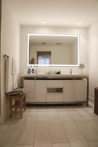 a kitchen with a sink a stove and a refrigerator
