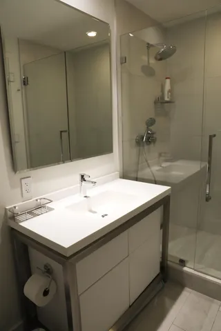a bathroom with a sink and a mirror