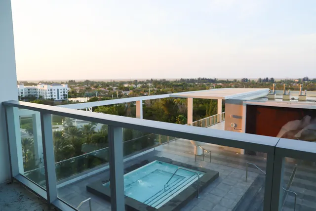 a view of a balcony with lake view and mountain view