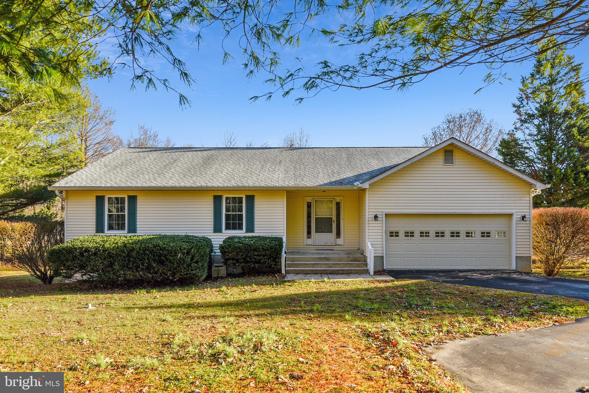2515 Potts Point Road Huntingtown, MD 20639 - Photo 1 of 19 a view of a house with a yard