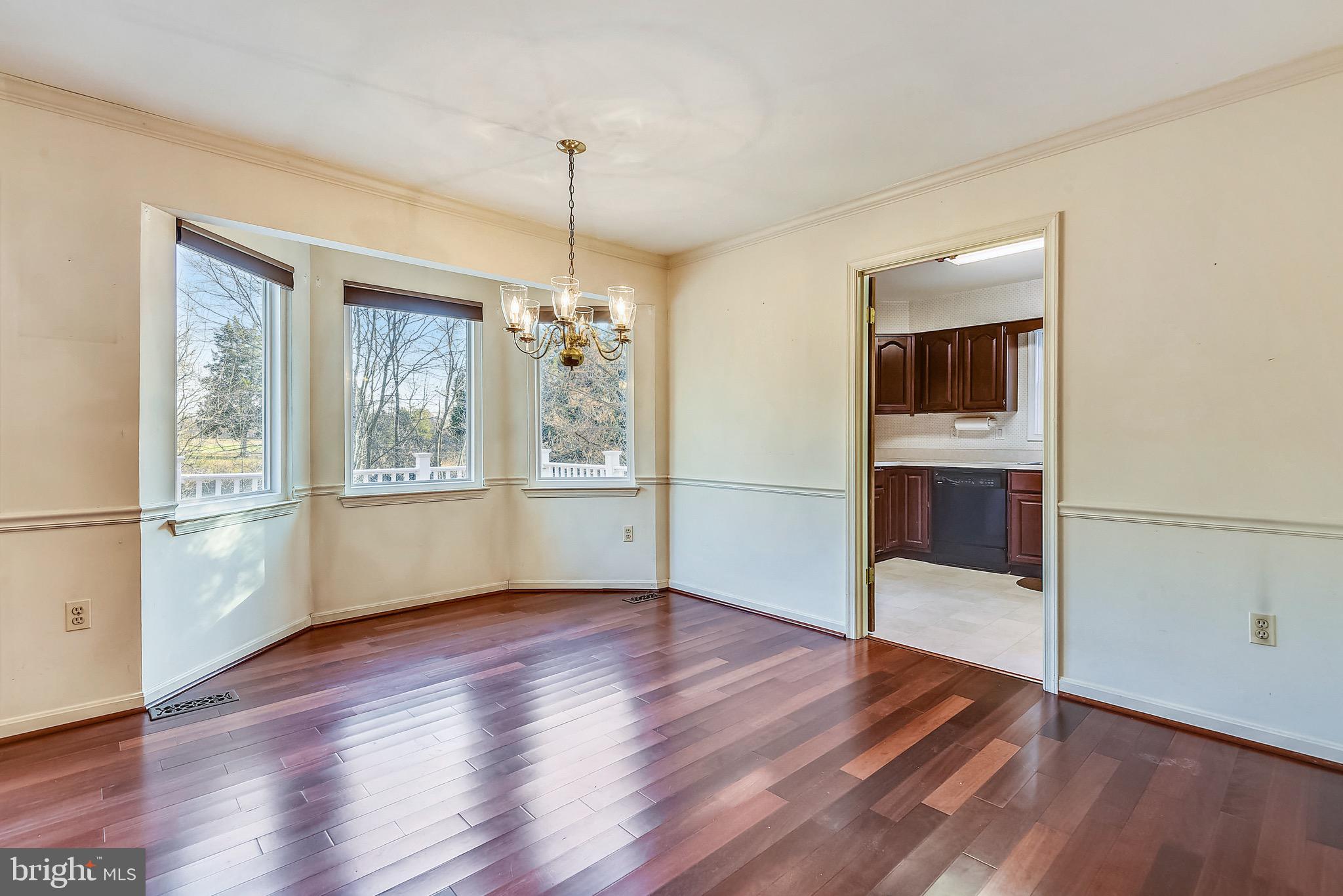 2515 Potts Point Road Huntingtown, MD 20639 - Photo 7 of 19 a view of livingroom with hardwood floor and window