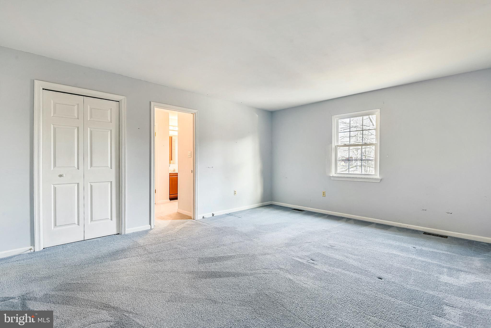2515 Potts Point Road Huntingtown, MD 20639 - Photo 10 of 19 an empty room with windows