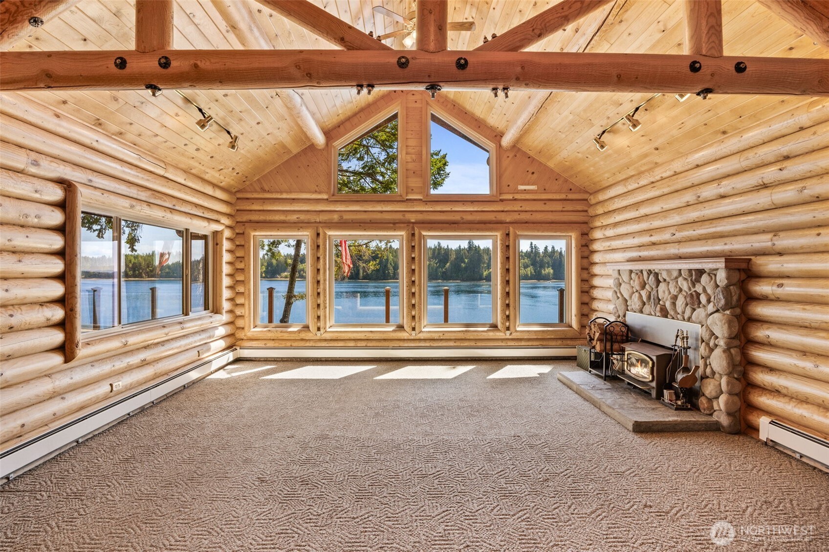 1236 East Island View Road Grapeview, WA 98546 - Photo 11 of 40 a view of a building with car parked