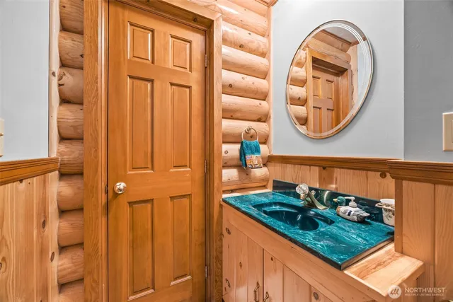 a view of a kitchen with a large window