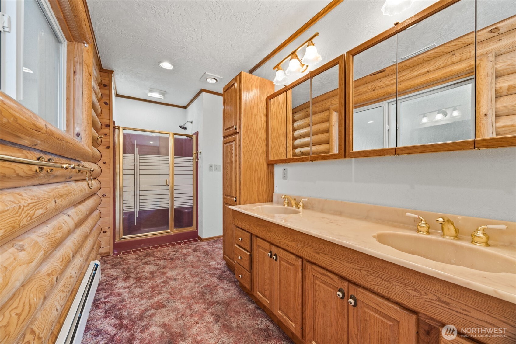1236 East Island View Road Grapeview, WA 98546 - Photo 20 of 40 a bathroom with a sink and a shower