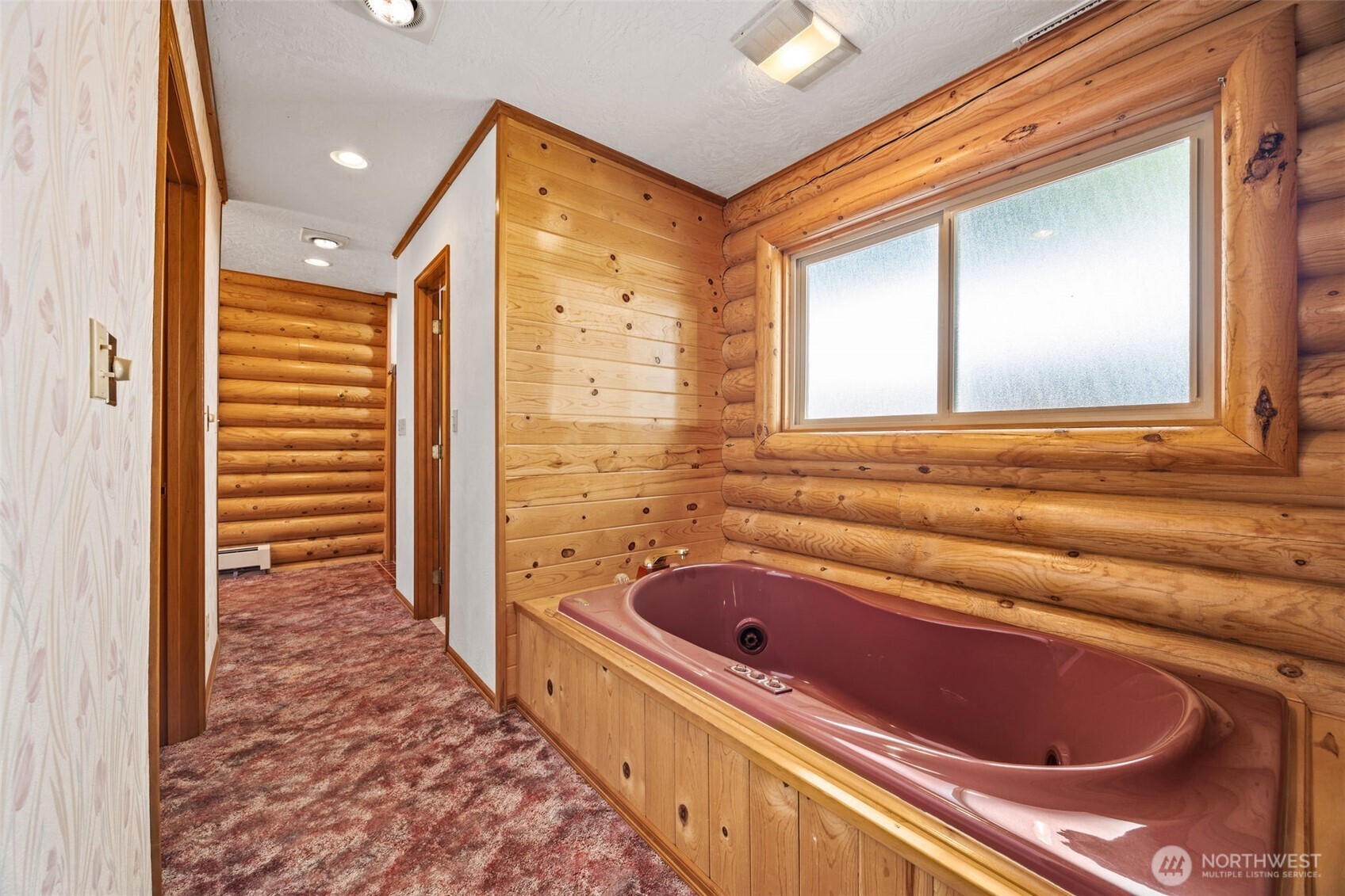 1236 East Island View Road Grapeview, WA 98546 - Photo 21 of 40 a bathroom with a bathtub and a sink