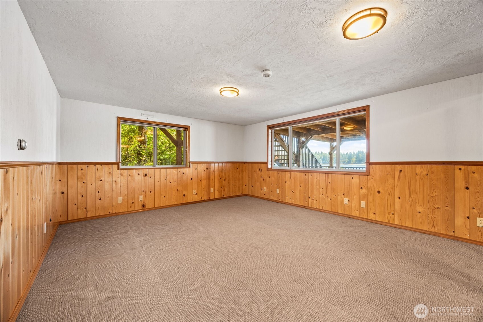 1236 East Island View Road Grapeview, WA 98546 - Photo 25 of 40 an empty room with windows