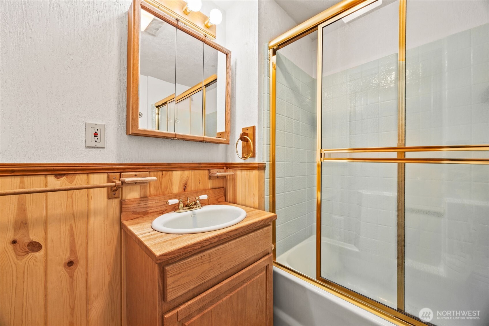 1236 East Island View Road Grapeview, WA 98546 - Photo 26 of 40 a bathroom with a sink and a mirror