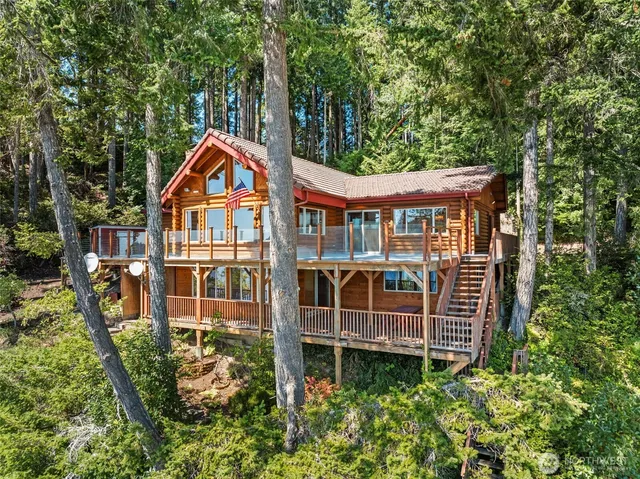 a view of a garden with a deck