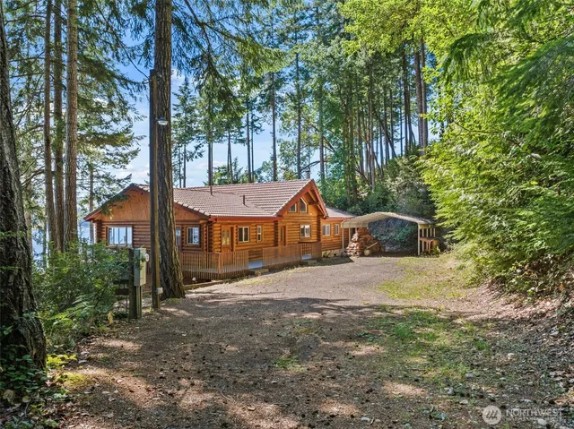 front view of a house with a trees