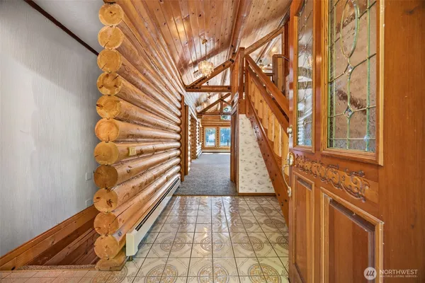 a view of entryway with wooden floor