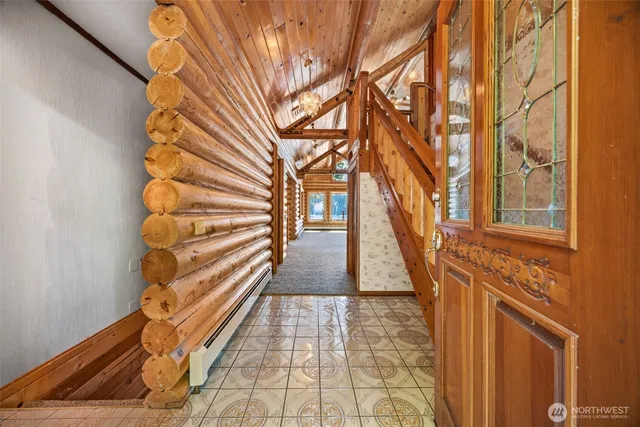 a view of entryway with wooden floor