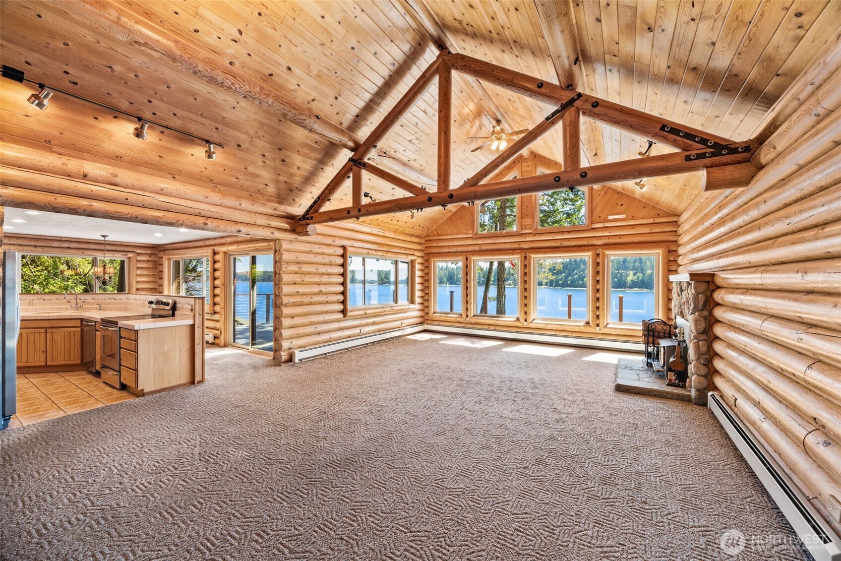 1236 East Island View Road Grapeview, WA 98546 - Photo 10 of 40 a view of an ocean with furniture