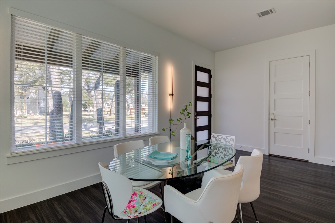 170 Bunker Rnch Boulevard, Unit 64 Dripping Springs, TX 78620 - Photo 11 of 37 a view of a room with furniture and wooden floor