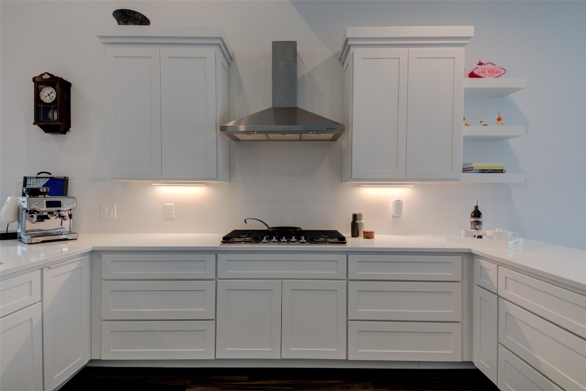 170 Bunker Rnch Boulevard, Unit 64 Dripping Springs, TX 78620 - Photo 2 of 37 a kitchen with a cabinets and a stove