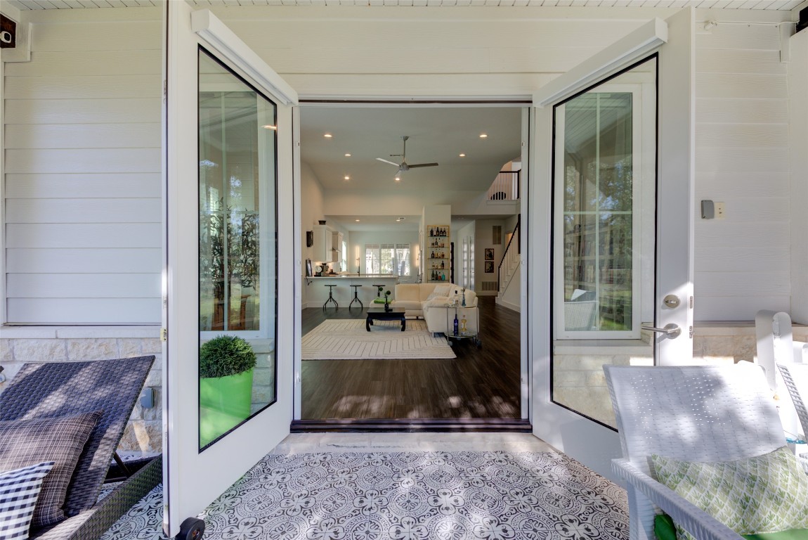 170 Bunker Rnch Boulevard, Unit 64 Dripping Springs, TX 78620 - Photo 23 of 37 a view of a living room and a balcony