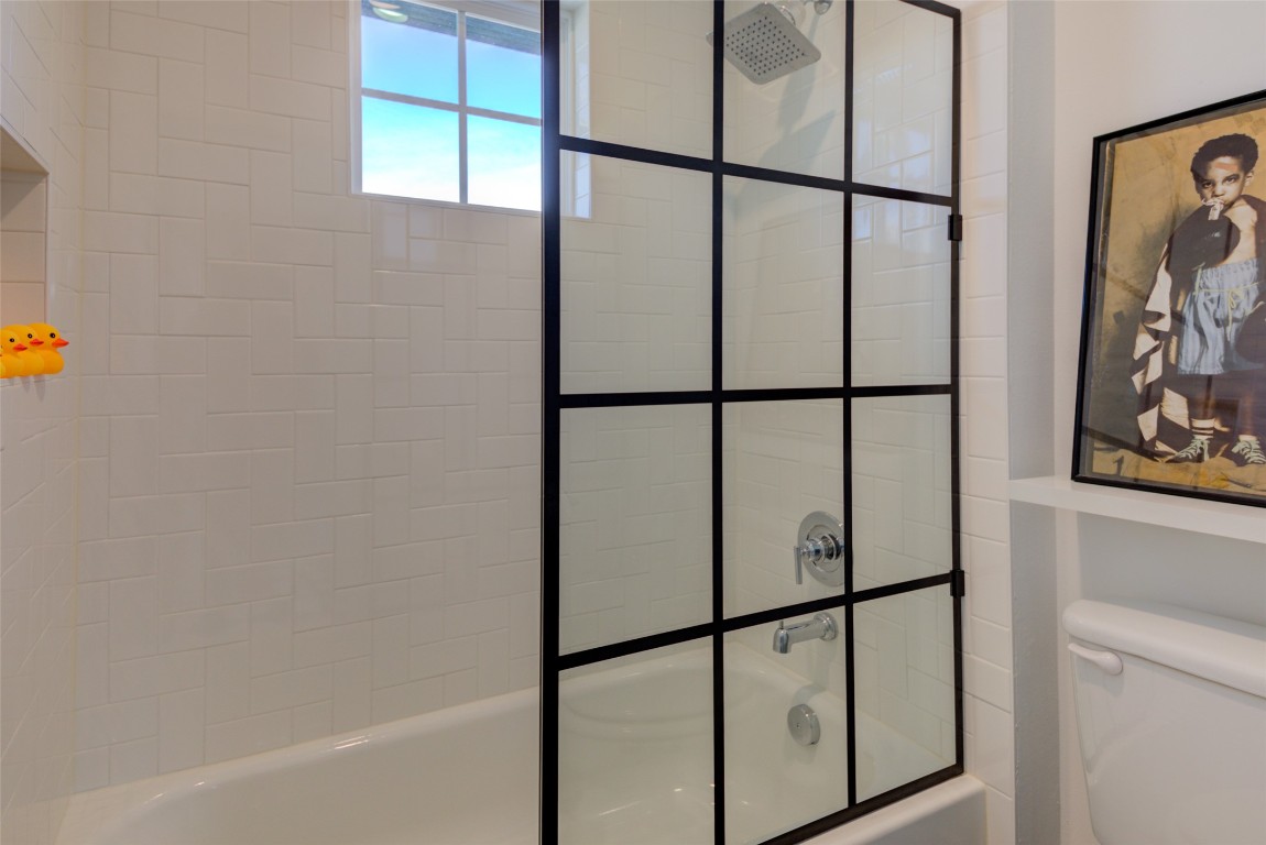 170 Bunker Rnch Boulevard, Unit 64 Dripping Springs, TX 78620 - Photo 34 of 37 a bathroom with a shower