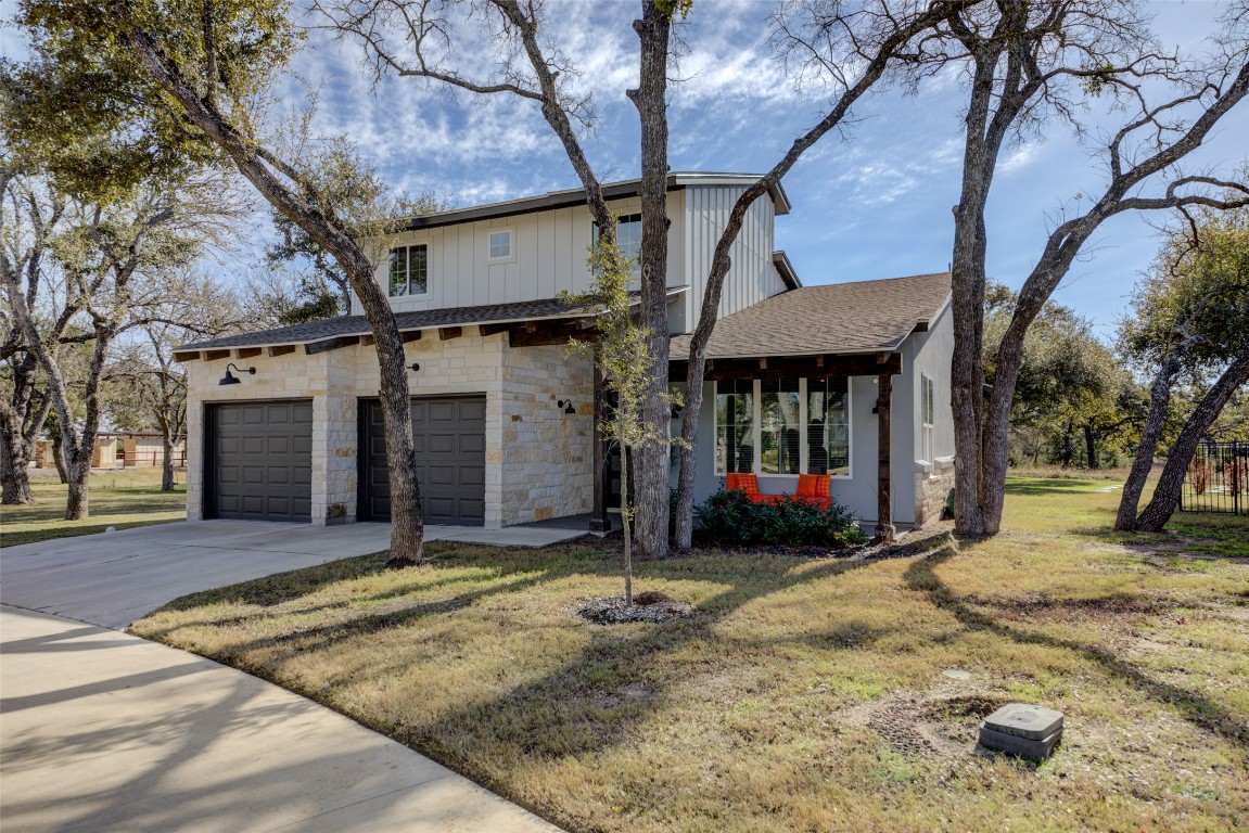 170 Bunker Rnch Boulevard, Unit 64 Dripping Springs, TX 78620 - Photo 6 of 37 a view of a house with a patio