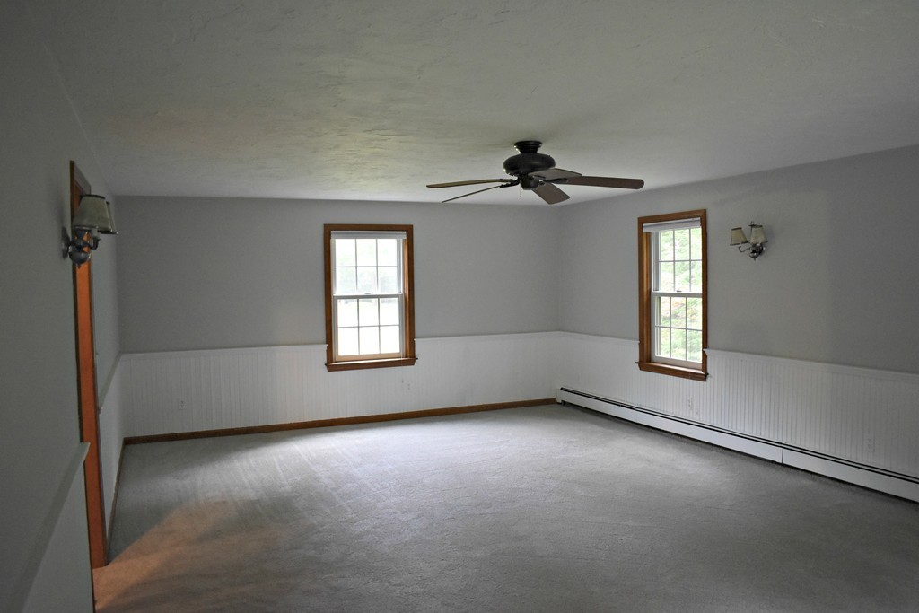 37 Throne Hill Road Groton, MA 01450 - Photo 17 of 30 a view of an empty room with a window