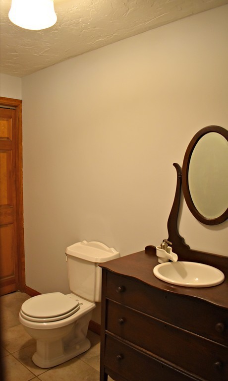 37 Throne Hill Road Groton, MA 01450 - Photo 19 of 30 a bathroom with a toilet and a sink