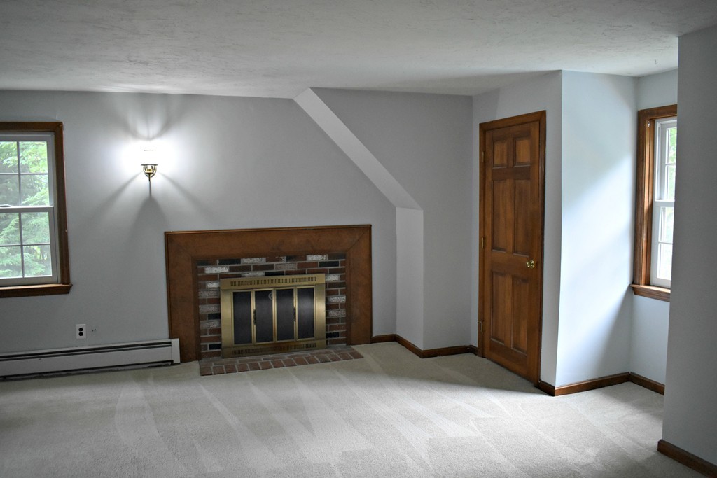 37 Throne Hill Road Groton, MA 01450 - Photo 23 of 30 a view of an empty room and fire place