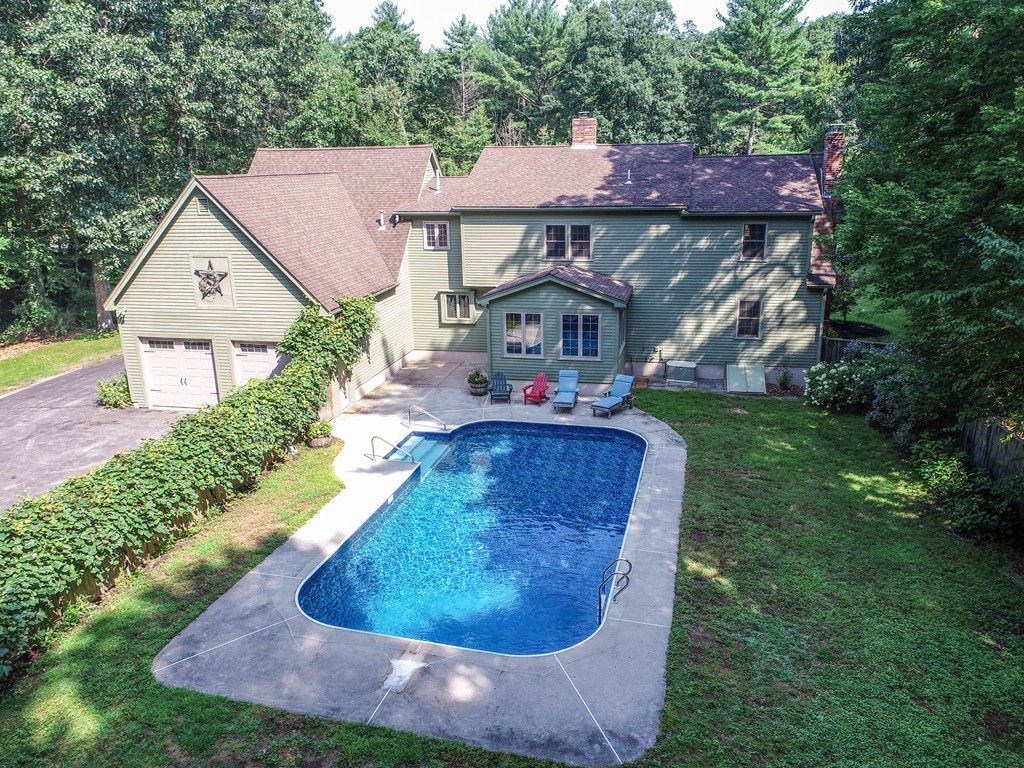 37 Throne Hill Road Groton, MA 01450 - Photo 6 of 30 a view of a house with a yard and trees