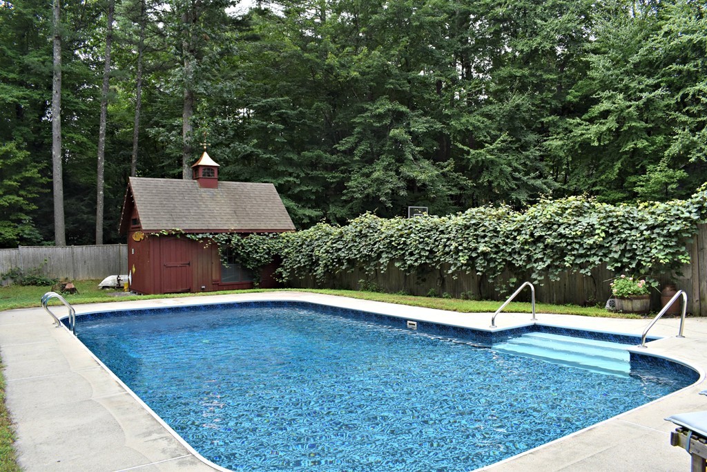 37 Throne Hill Road Groton, MA 01450 - Photo 8 of 30 a view of a backyard with swimming pool