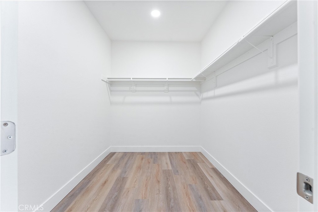 1981 Lyon Avenue Riverside, CA 92503 - Photo 25 of 58 a view of a room with wooden floor