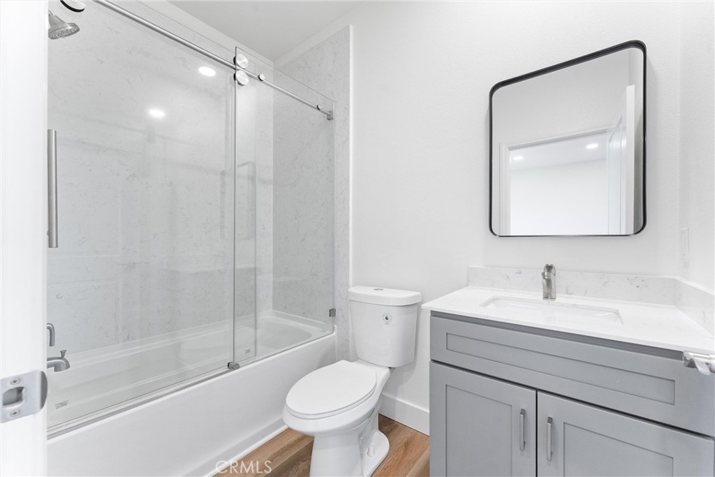 1981 Lyon Avenue Riverside, CA 92503 - Photo 37 of 58 a bathroom with a sink toilet and shower