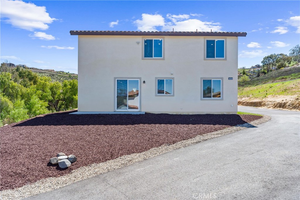 1981 Lyon Avenue Riverside, CA 92503 - Photo 46 of 58 a view of a house with backyard and garden