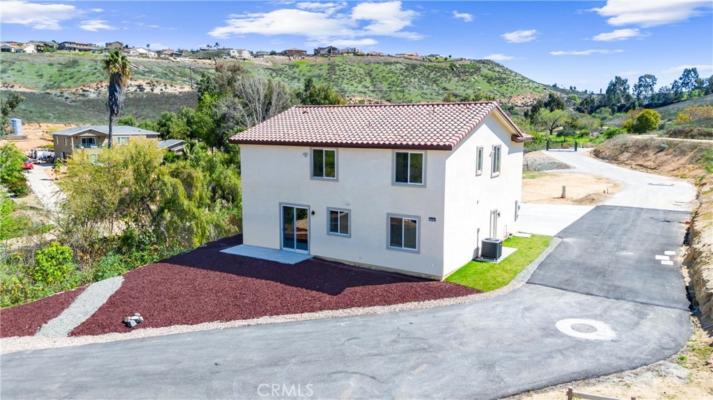 1981 Lyon Avenue Riverside, CA 92503 - Photo 5 of 58 a view of a house with a yard