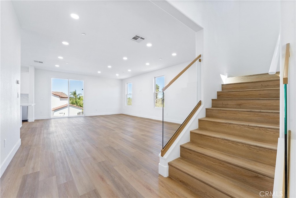 1981 Lyon Avenue Riverside, CA 92503 - Photo 6 of 58 a view of entryway and hall with wooden floor
