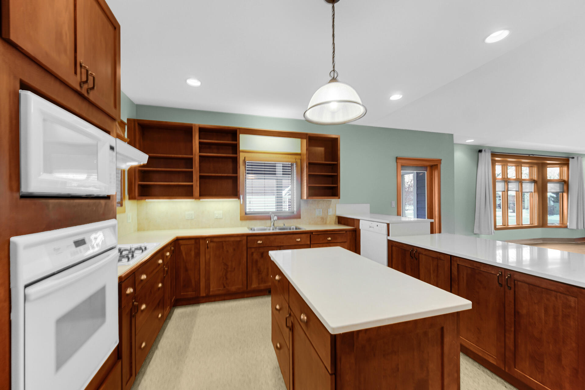 2425 Dickinson Road Chesterton, IN 46304 - Photo 13 of 41 a very nice looking kitchen with a center island wooden floor and stainless steel appliances