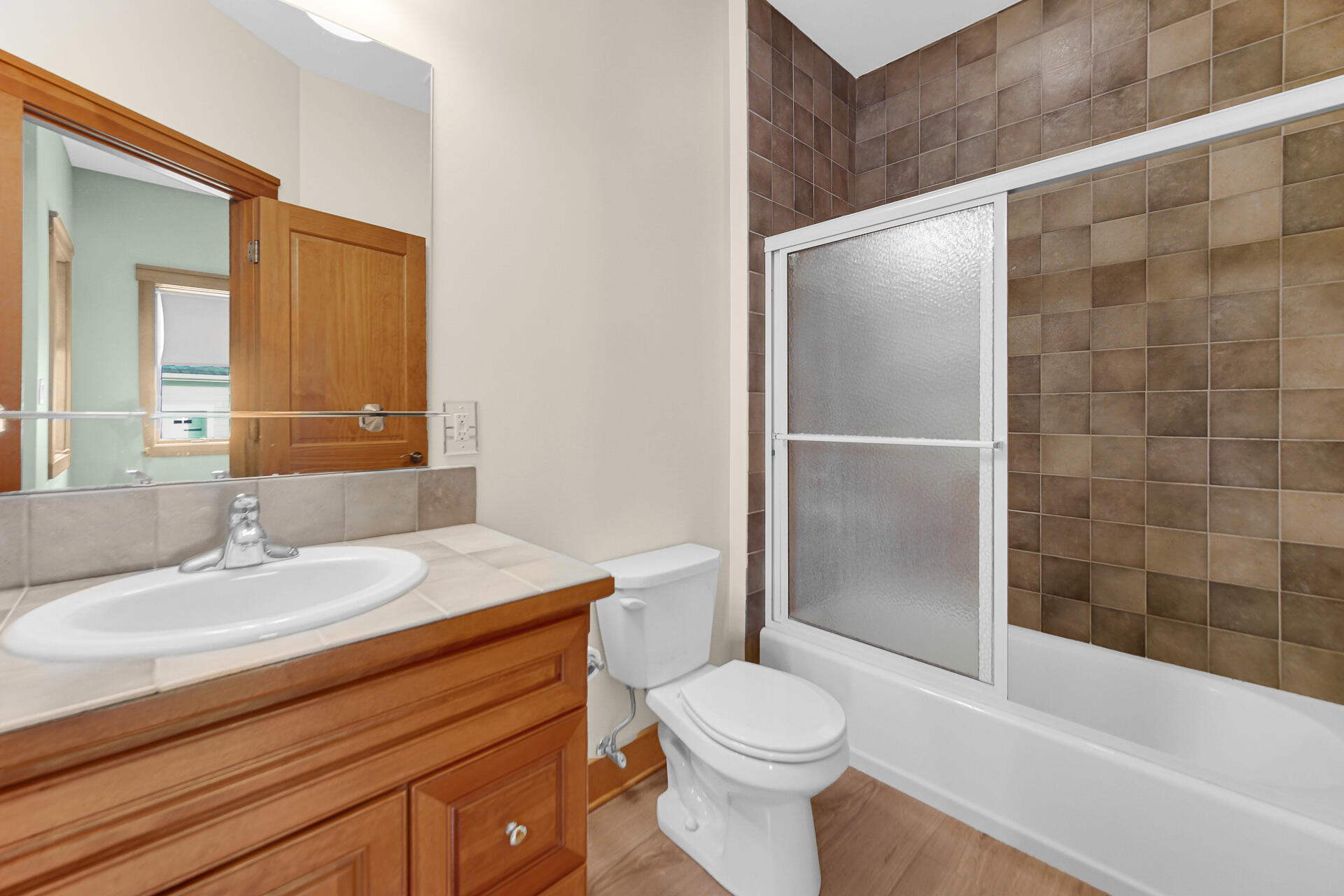 2425 Dickinson Road Chesterton, IN 46304 - Photo 20 of 41 a bathroom with a sink a toilet and shower