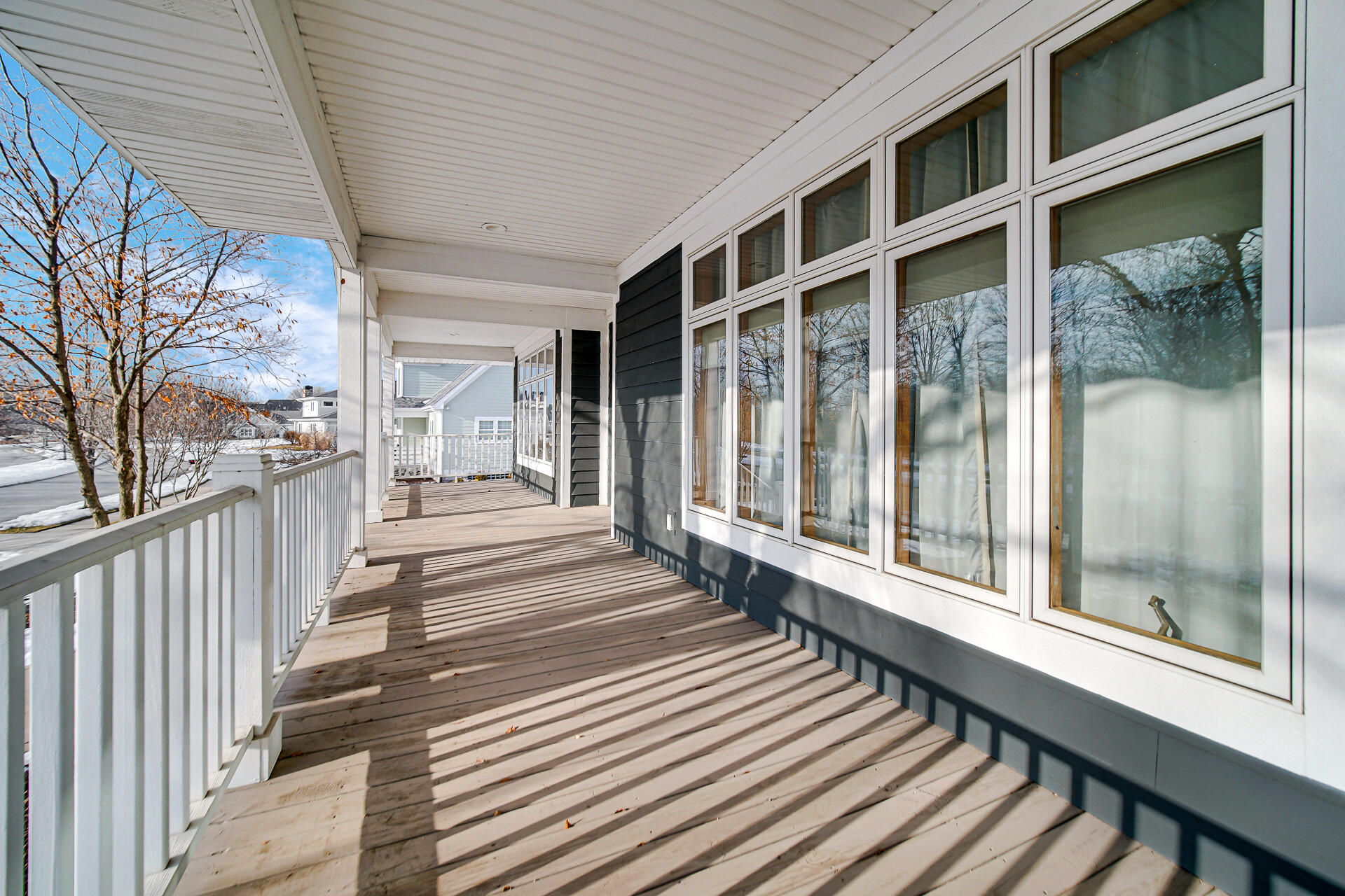 2425 Dickinson Road Chesterton, IN 46304 - Photo 2 of 41 a view of a balcony with wooden floor