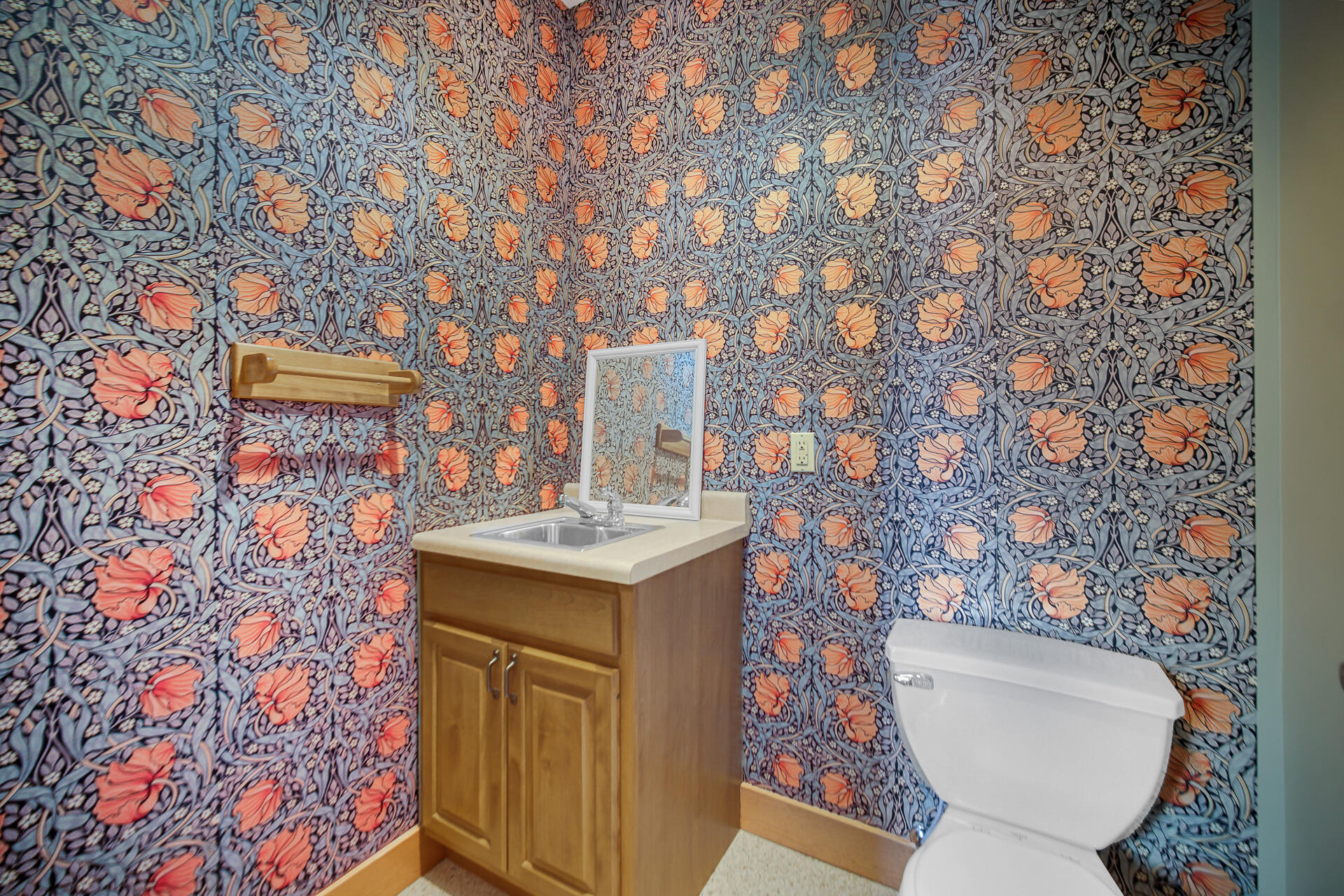 2425 Dickinson Road Chesterton, IN 46304 - Photo 23 of 41 a bathroom with a sink and mirror with toilet