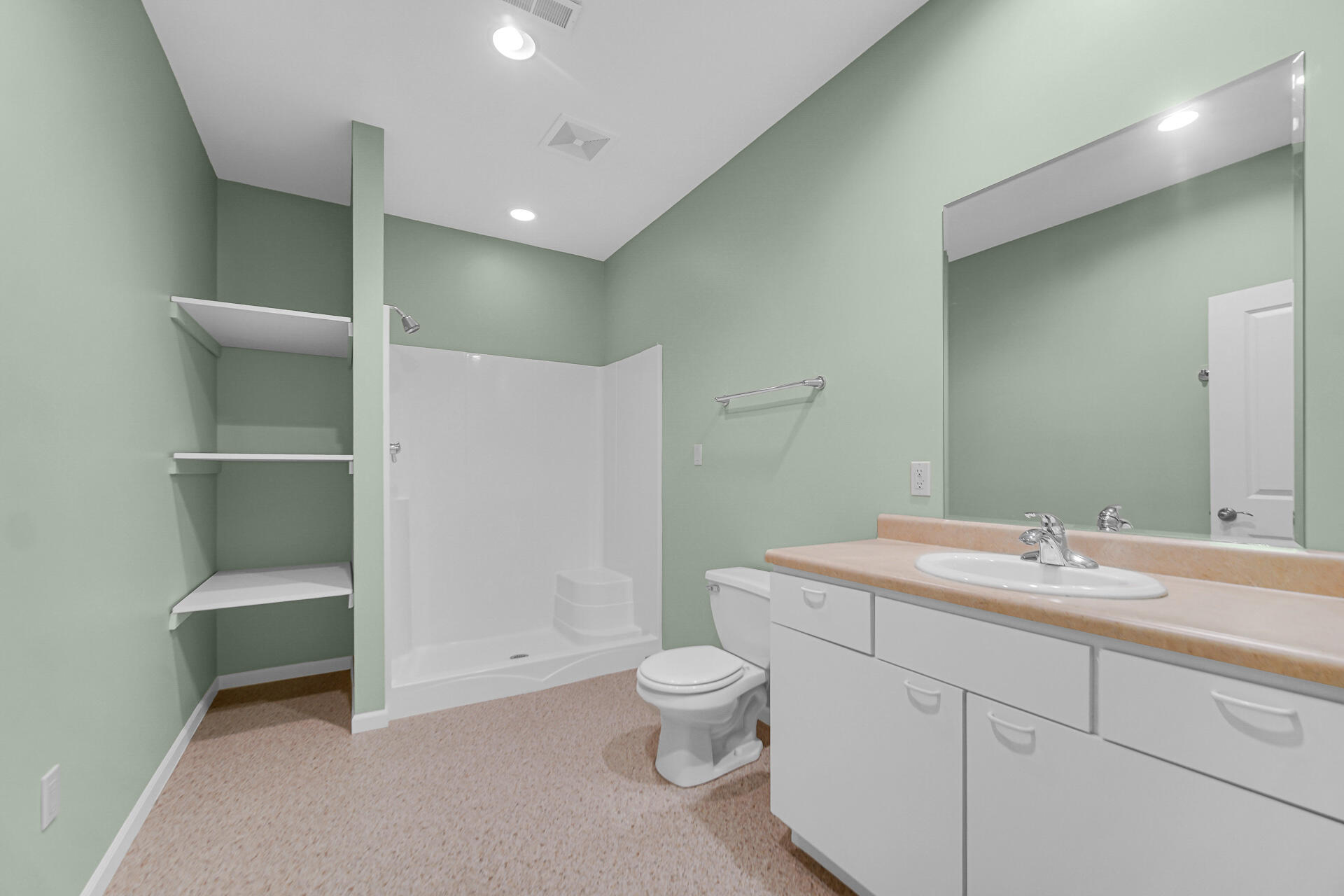 2425 Dickinson Road Chesterton, IN 46304 - Photo 28 of 41 a spacious bathroom with a sink a toilet a large mirror and shower