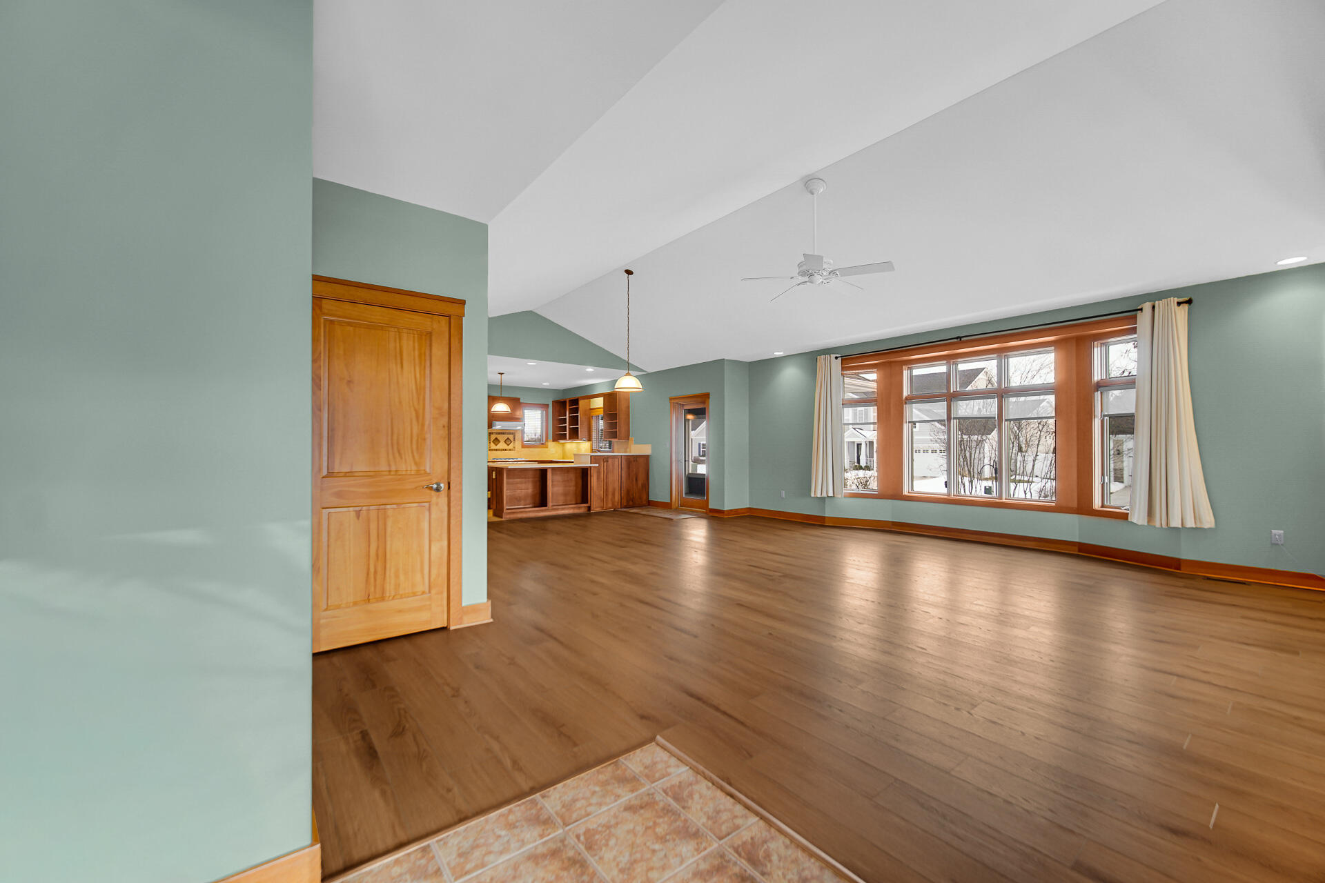 2425 Dickinson Road Chesterton, IN 46304 - Photo 3 of 41 a view of empty room with wooden floor and fan