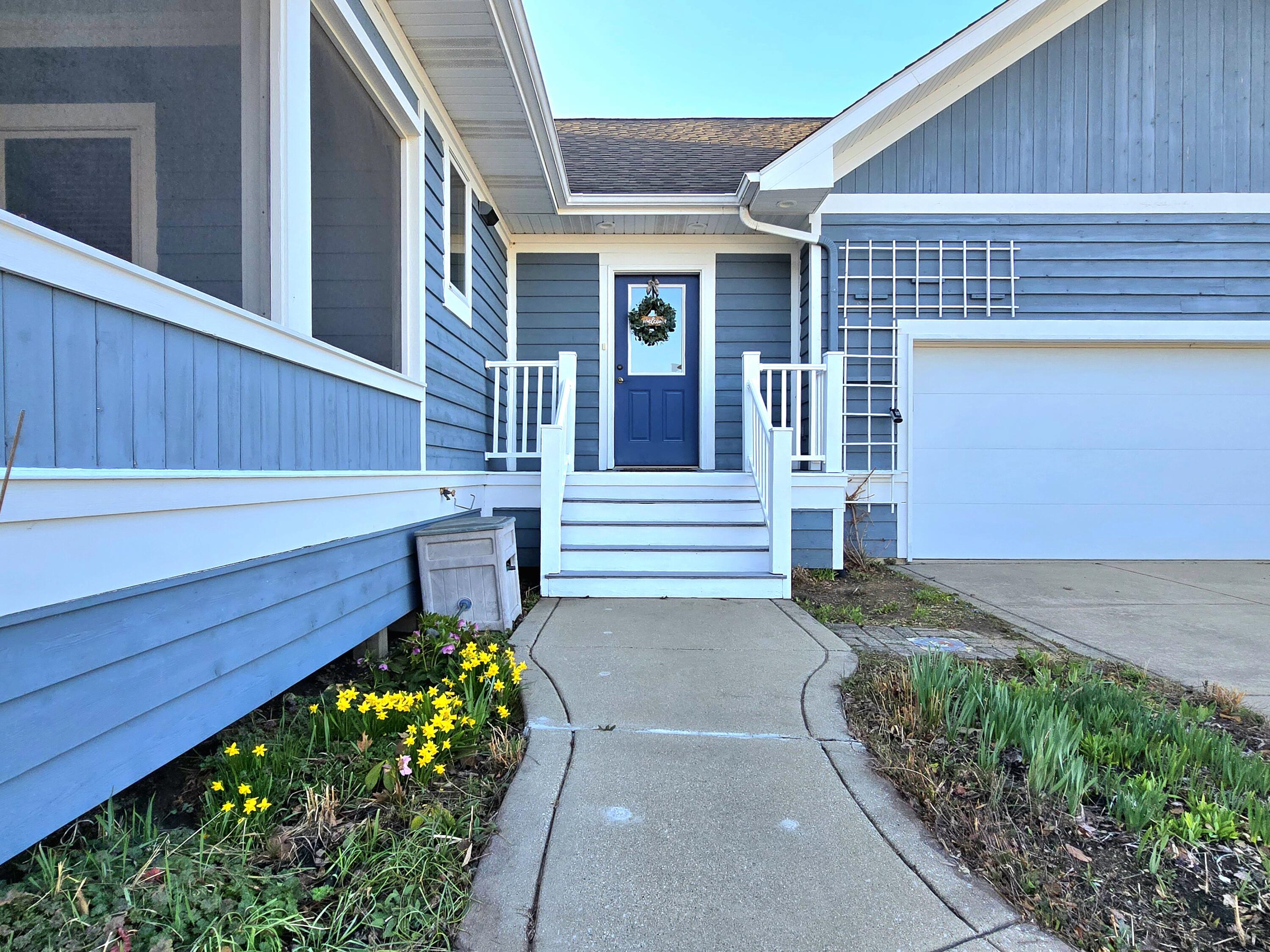 2425 Dickinson Road Chesterton, IN 46304 - Photo 36 of 41 a front view of a house with a garden